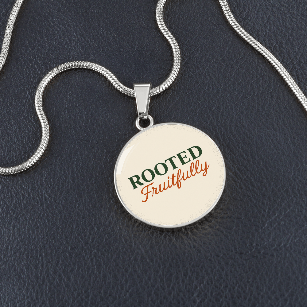 Hurry and get this Rooted Fruitfully round surgical steel necklace that looks great for all occasions, you be the judge.