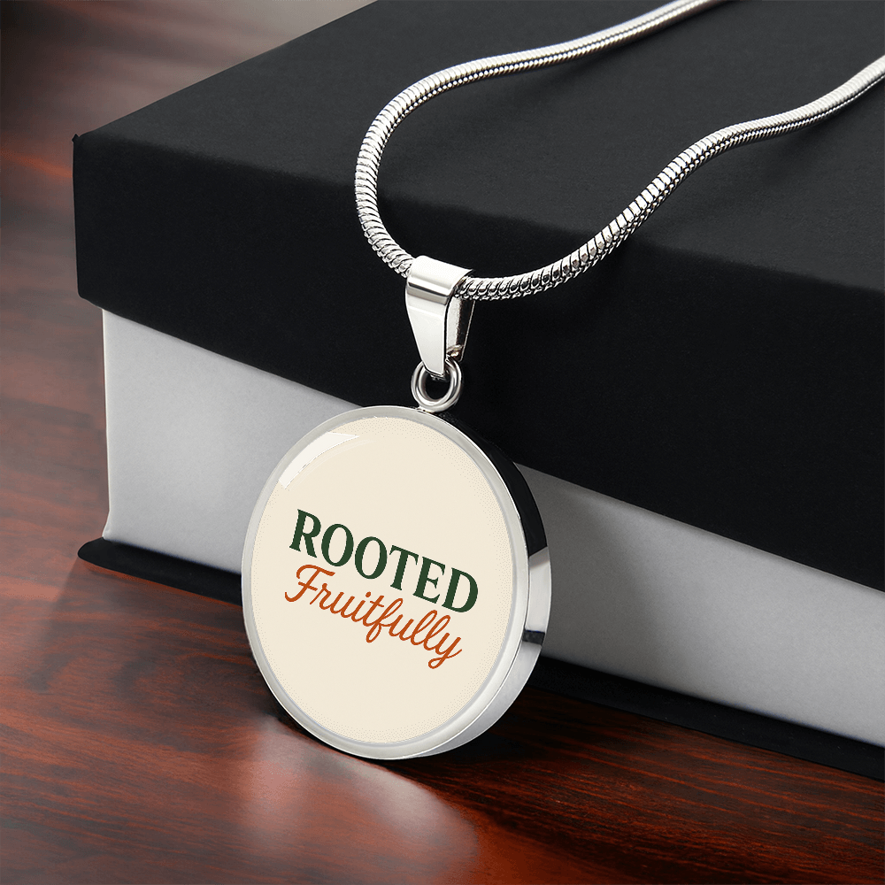 Hurry and get this Rooted Fruitfully round surgical steel necklace that looks great for all occasions, you be the judge.