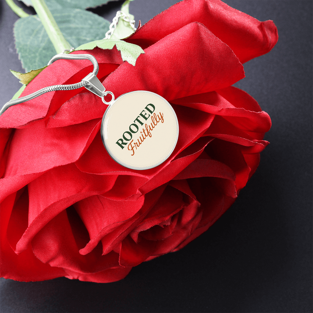 Hurry and get this Rooted Fruitfully round surgical steel necklace that looks great for all occasions, you be the judge.