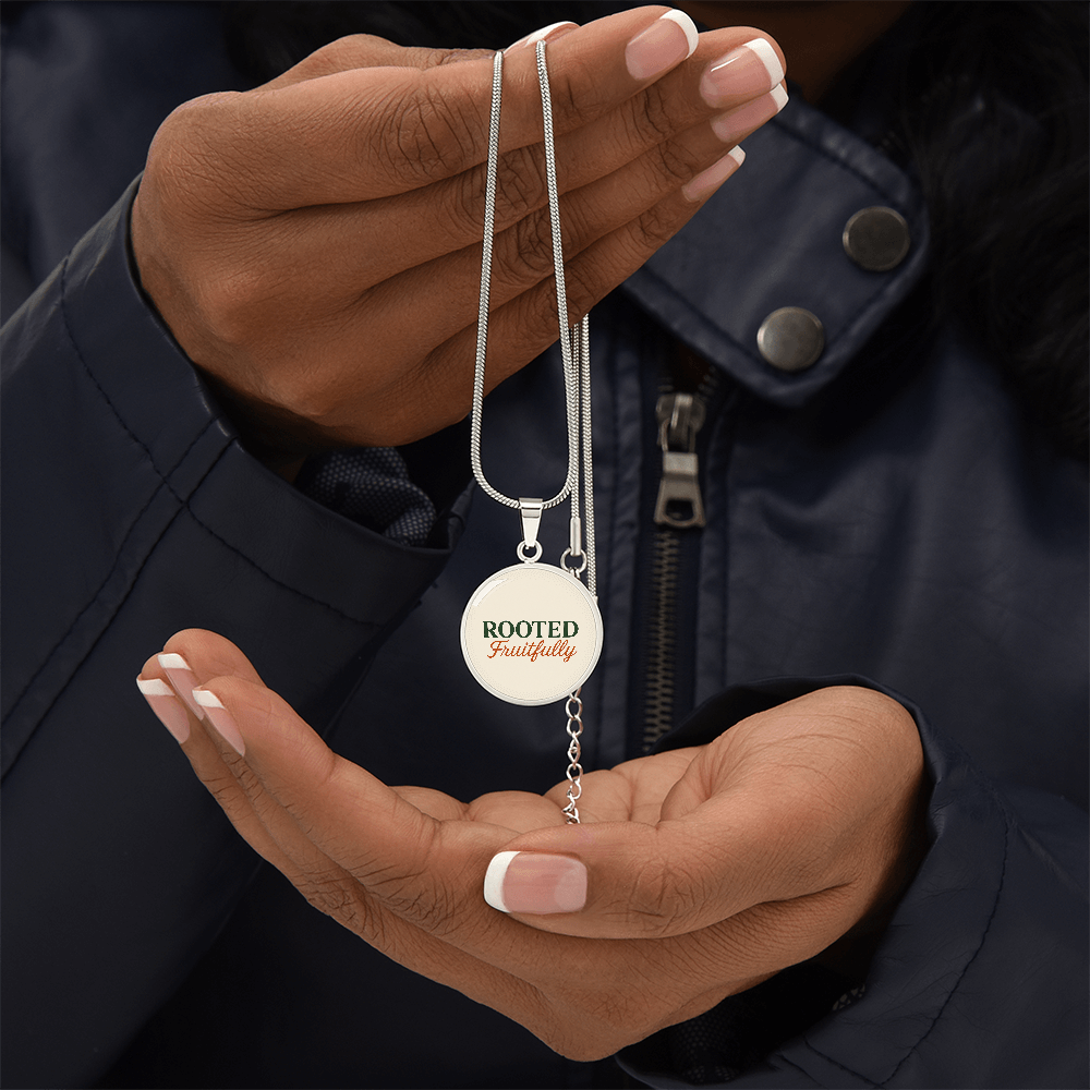 Hurry and get this Rooted Fruitfully round surgical steel necklace that looks great for all occasions, you be the judge.