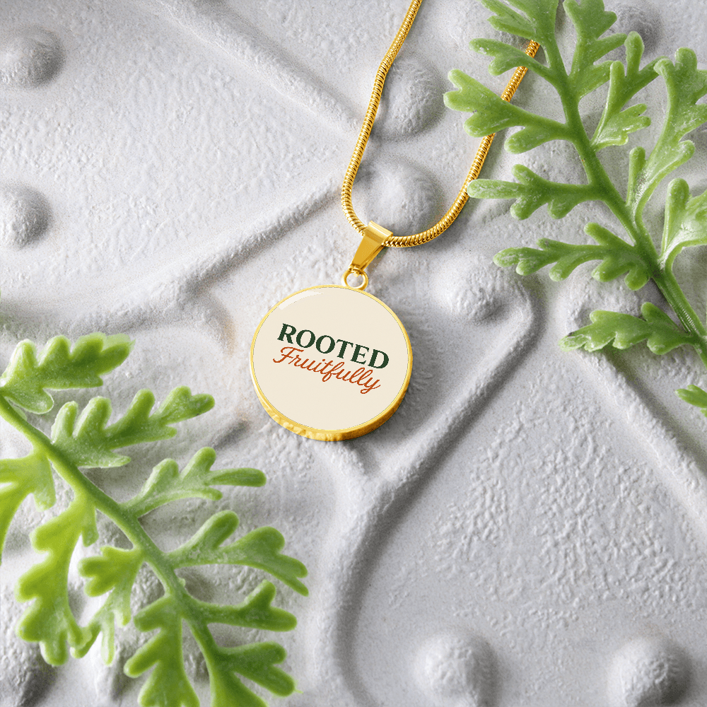 Hurry and get this Rooted Fruitfully round surgical steel necklace that looks great for all occasions, you be the judge.
